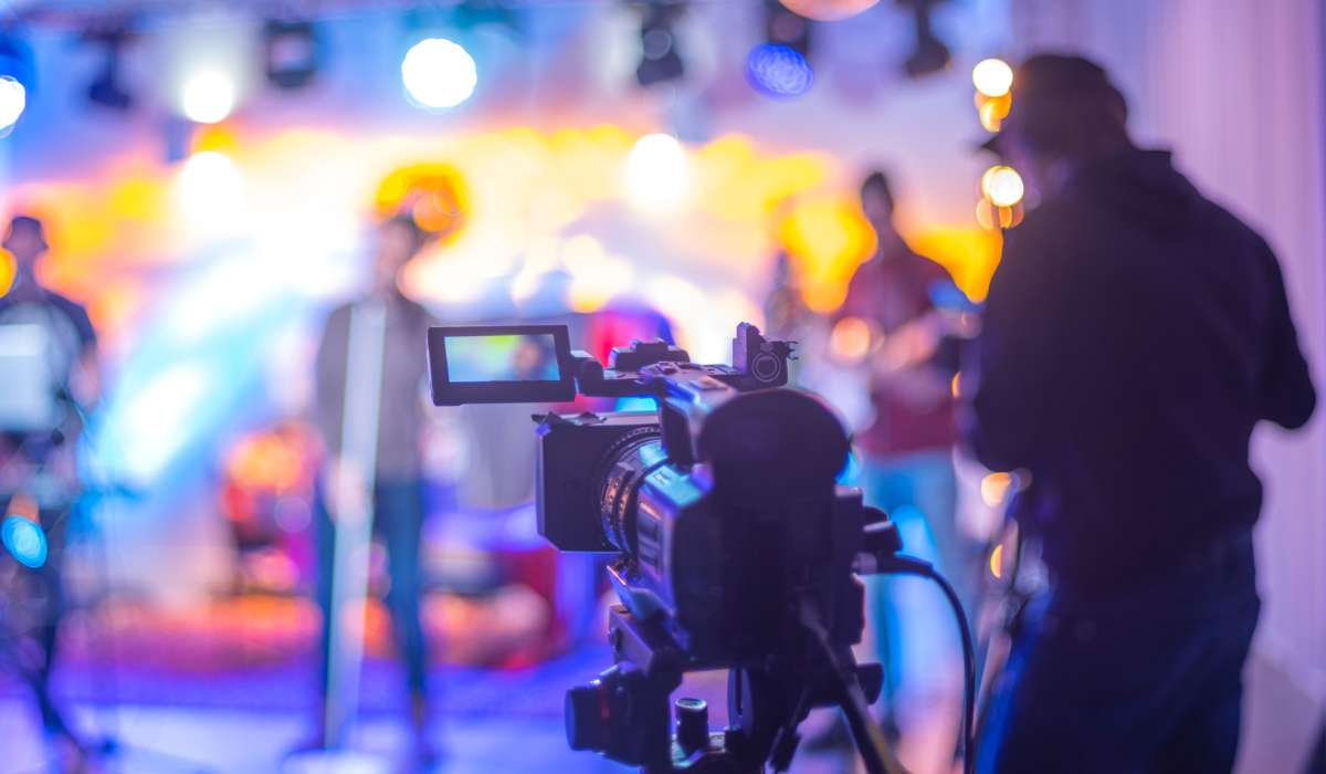a camera set up in front of a stage