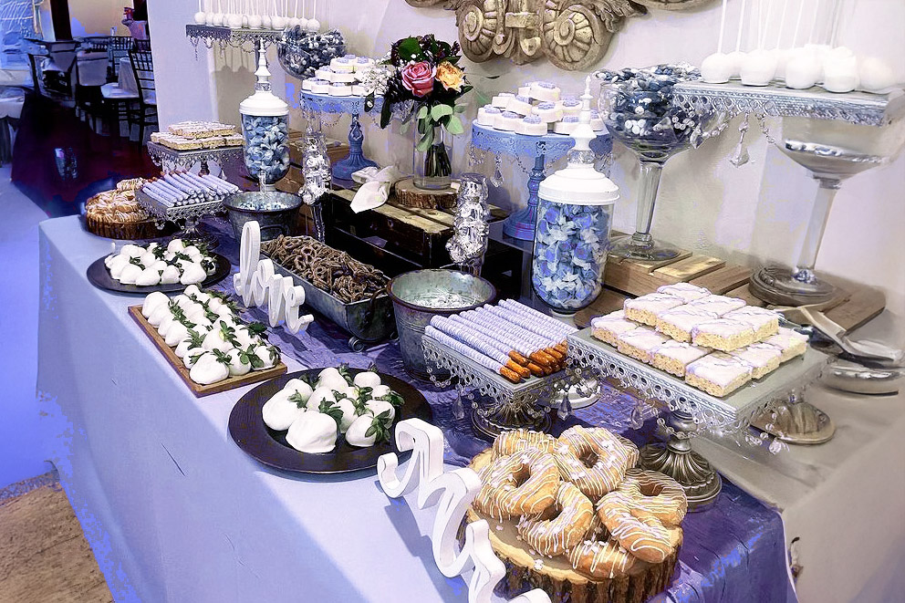 a table with a variety of desserts on it